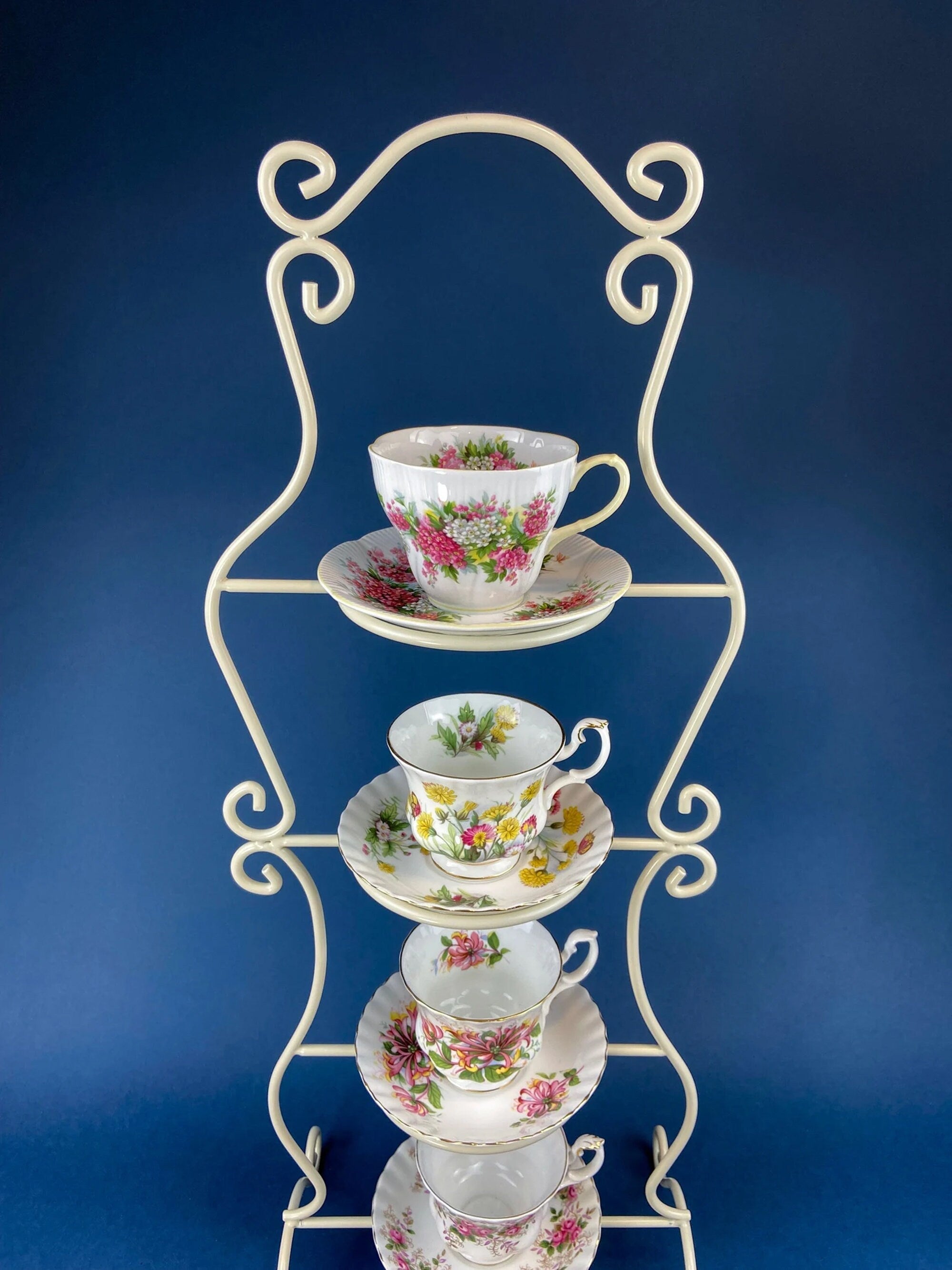 Antique Bavarian Porcelain Tea Trio. Winterling Roslaw. Cup, Saucer, and Dessert Plate in Gold and Pink. Modern Lotus Pattern.